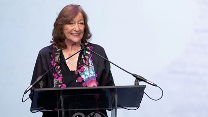 Woman at a podium