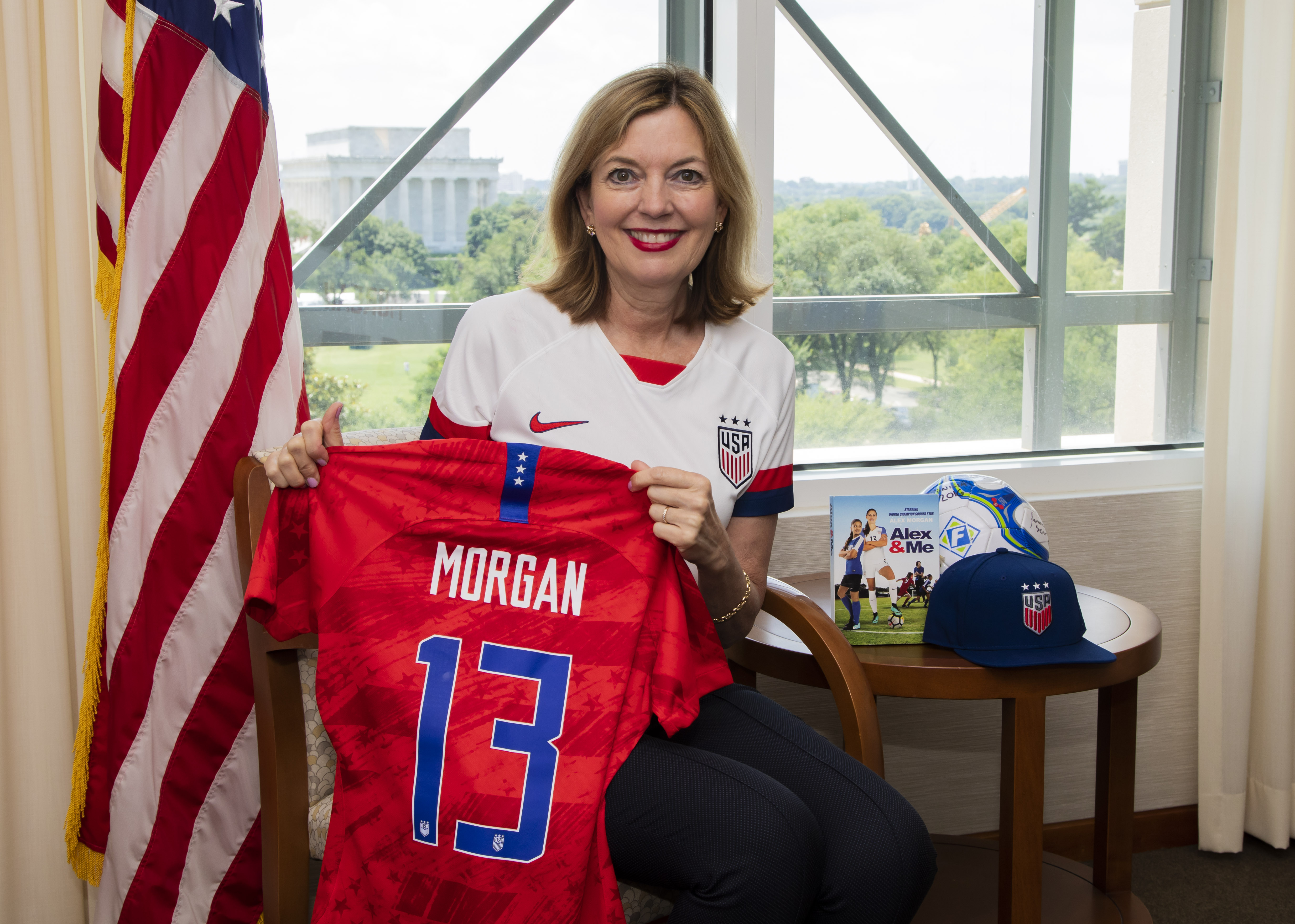 Assistant Secretary Marie Royce and Alex Morgan shirt