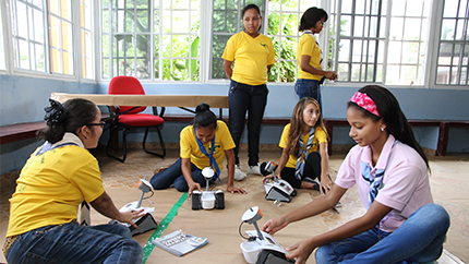 Panamanian girls work on a project during their “Wonderful Information and Communications Technology (ICT) Girls Can Do It” program.
