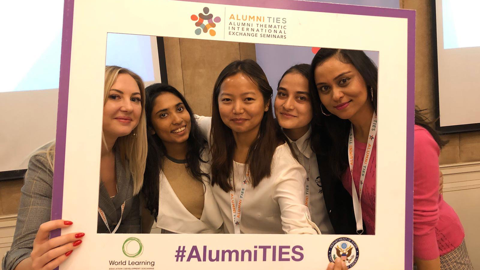 Five alumni at Alumni TIES in Almaty, Kazakhstan