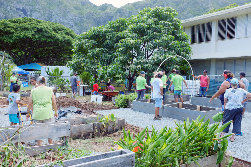 People walking through a garden