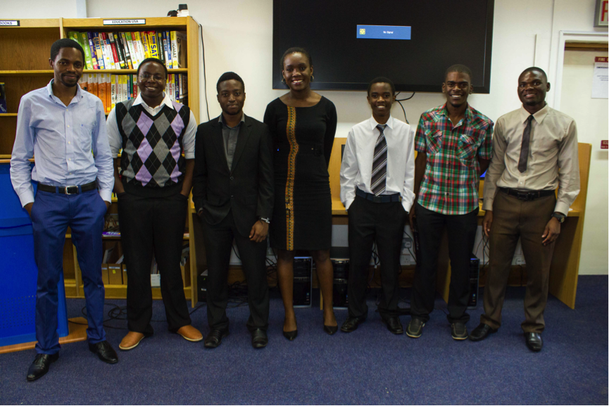 Group of young people standing and smiling