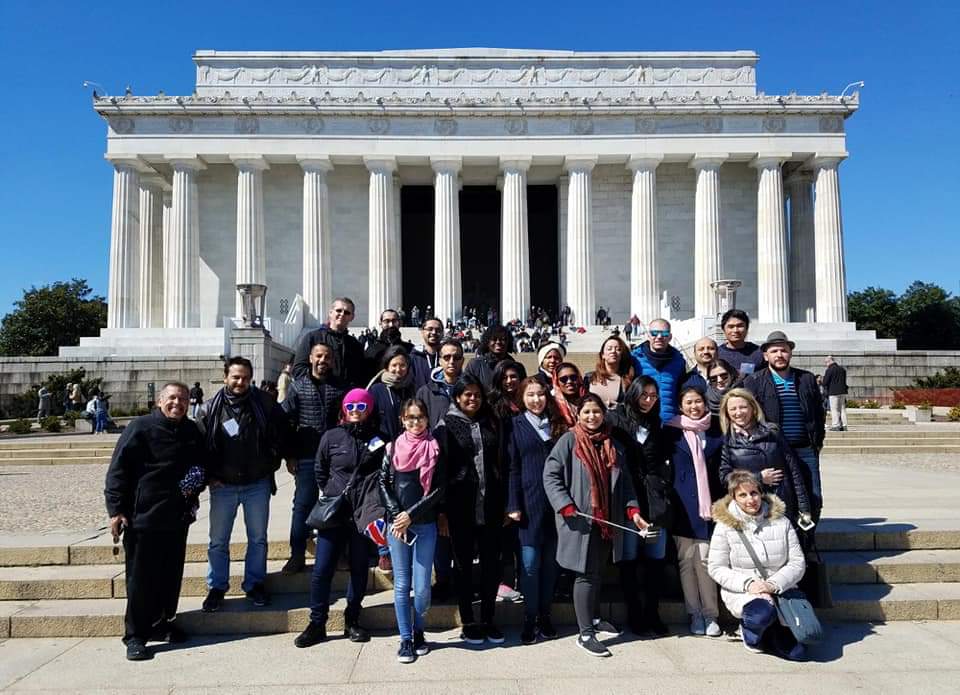 Doa Naqvi with IVLP group in front of Lincoln Memorial