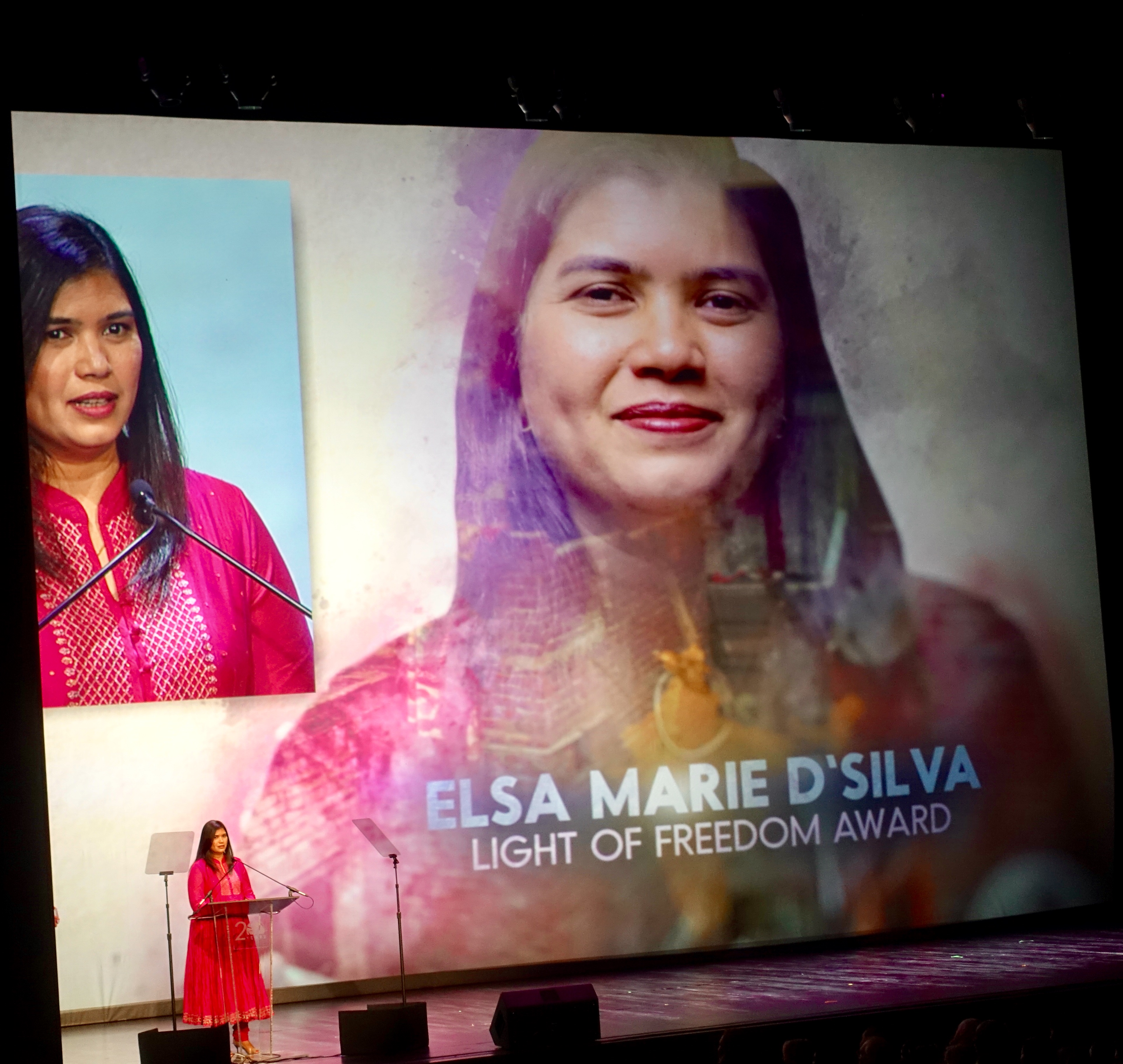 Elsa Marie D'Silva, Vital Voices Alumna and Research Scholar, accepting Light of Freedom Award