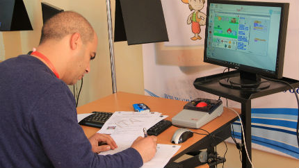 team participant working at computer