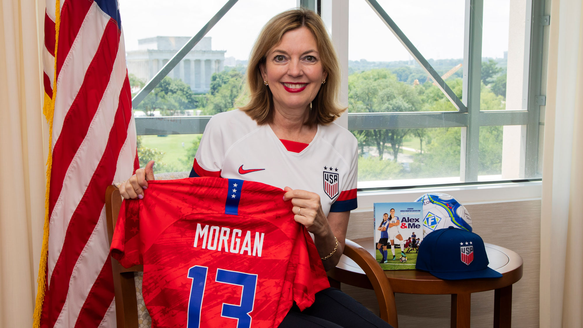 Assistant Secretary Marie Royce and Alex Morgan shirt