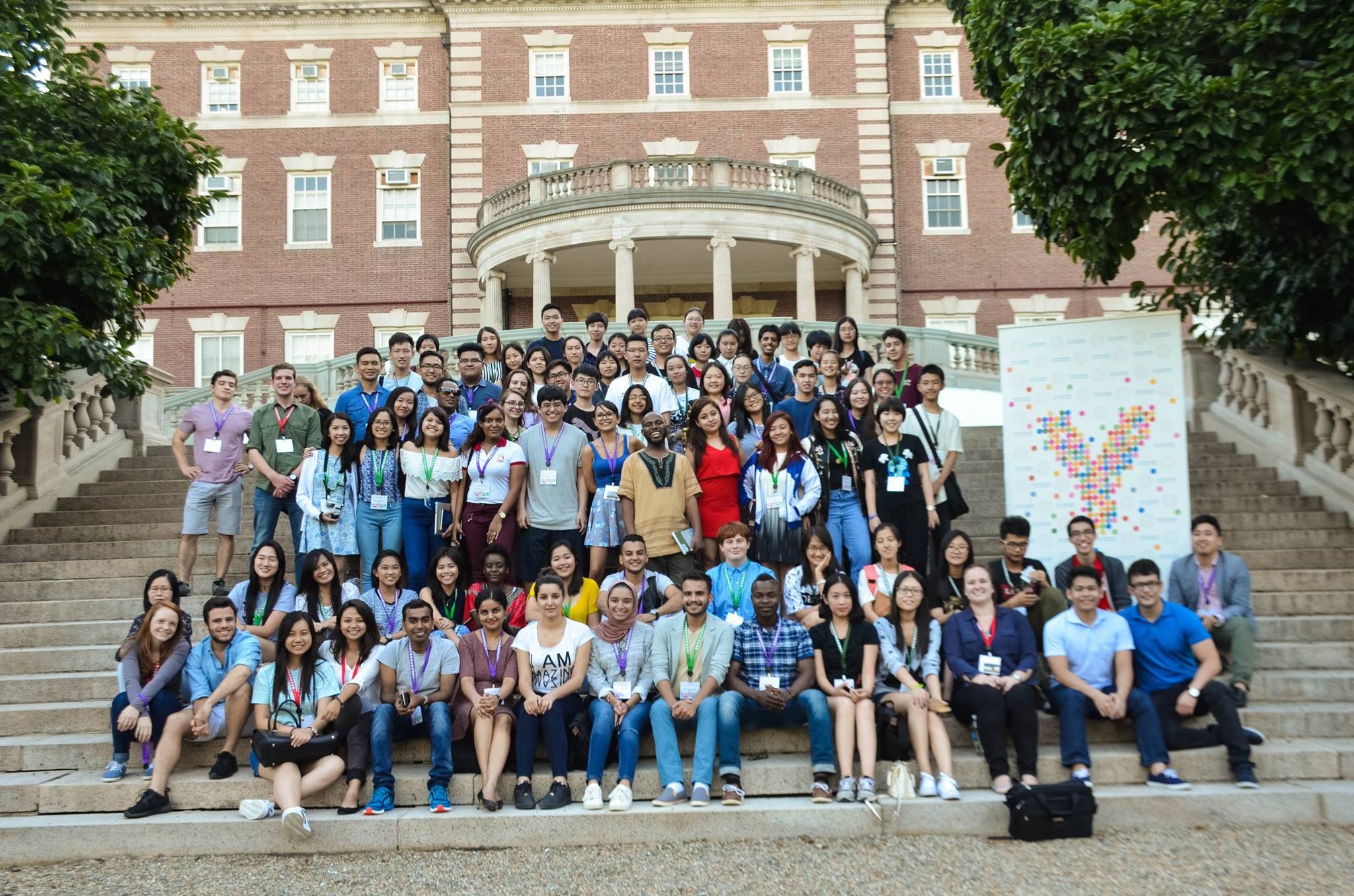 Large group photo on steps of building