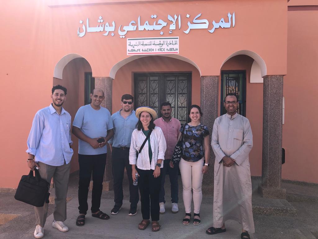 Errachid (far-left) and Alena (center, in hat) with Seeds of Life team members and local government officials after a meeting in Bouchan, Morocco. (Photo credit: Alena Klimas)