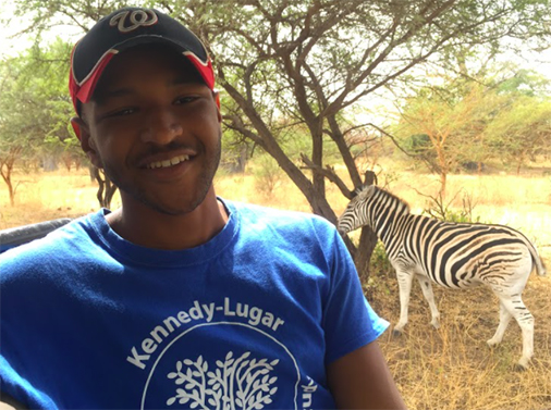 Jason Carroll and a zebra