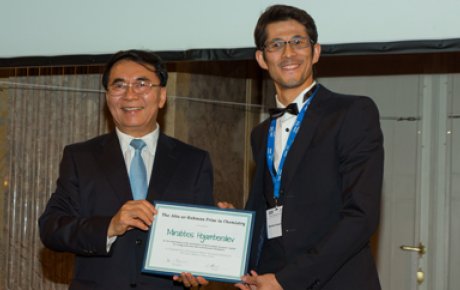 Scientist being presented with certificate award