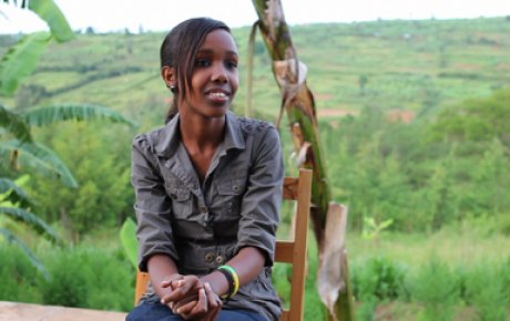 Still image of an alumna from the video.