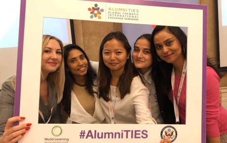 Five alumni at Alumni TIES in Almaty, Kazakhstan