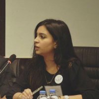 Lilav speaking on a panel